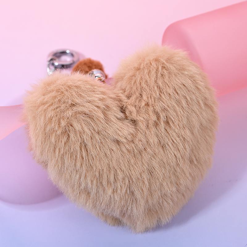 Light brown heart-shaped bag hanging	MAB102-I