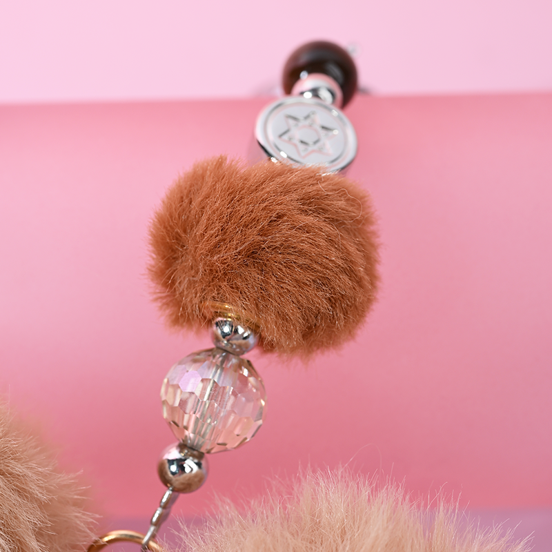 Light brown heart-shaped bag hanging	MAB102-I